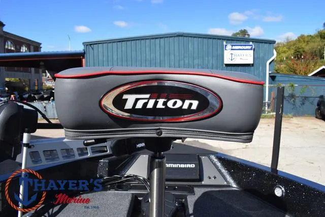 Slide: The Image of 2024 Triton 206 Allure boat seat at Thayer's Marine dealership. - 14