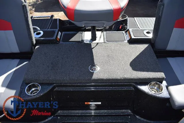 Slide: The Image of 2024 Triton 206 Allure boat interior with seating and cup holders. - 33
