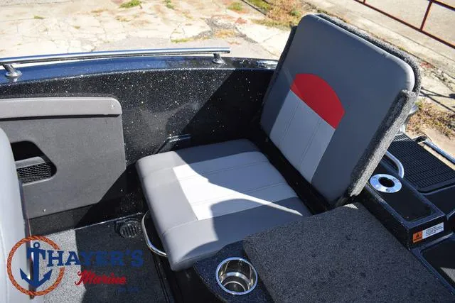 Slide: The Image of 2024 Triton 206 Allure boat interior with seating and cup holder. - 37