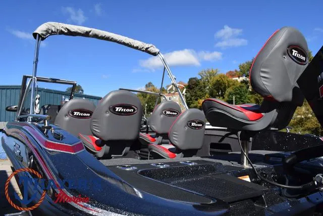 Slide: The Image of 2024 Triton 206 Allure boat interior with sleek seating and modern design. - 44