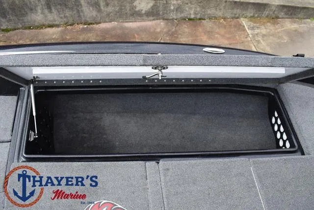 Slide: The Image of 2017 Phoenix Bass Boats 920 ProXP storage compartment, Thayer's Marine logo visible. - 15