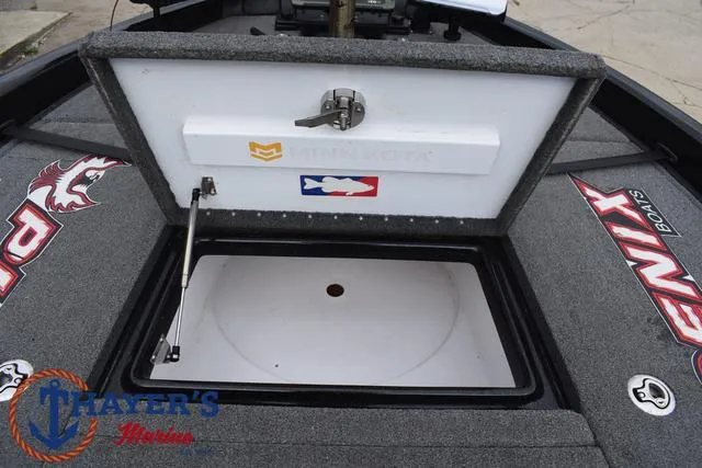 Slide: The Image of 2017 Phoenix Bass Boats 920 ProXP storage compartment with branding and logos. - 17