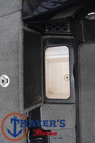 Slide: The Image of 2017 Phoenix Bass Boats 920 ProXP storage compartment, Thayer's Marine logo visible. - 21