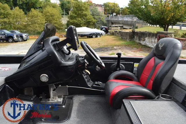 Slide: The Image of 2017 Phoenix Bass Boats 920 ProXP interior with steering console and seating. - 27