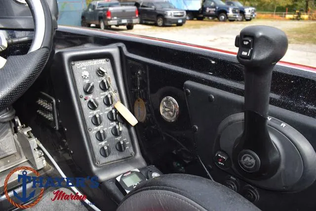 Slide: The Image of 2017 Phoenix Bass Boats 920 ProXP dashboard with control panel and throttle lever. - 31