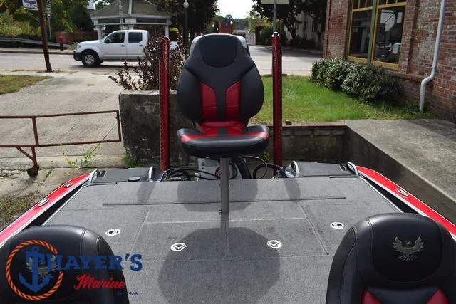 Slide: The Image of 2017 Phoenix Bass Boats 920 ProXP with red and black seating, displayed at Thayer's Marine. - 33