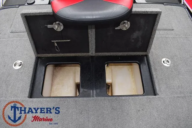 Slide: The Image of 2017 Phoenix Bass Boats 920 ProXP deck with storage compartments and seat, Thayer's Marine logo. - 36