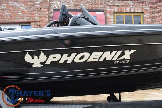 Slide: The Image of 2017 Phoenix Bass Boats 920 ProXP with logo, displayed at Thayer's Marine. - 4