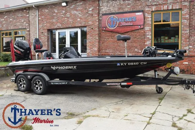Slide: The Image of 2017 Phoenix Bass Boats 920 ProXP at Thayer's Marine, brick building background. - 44