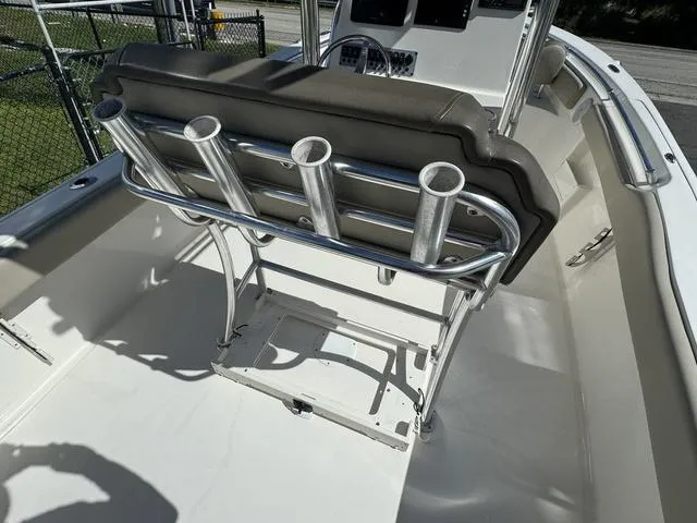 Slide: The Image of 2022 Key West 239FS boat interior with rod holders and seating. - 11