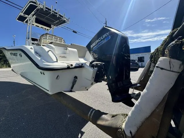 Slide: The Image of 2022 Key West 239FS boat with Mercury outboard motor on trailer. - 4