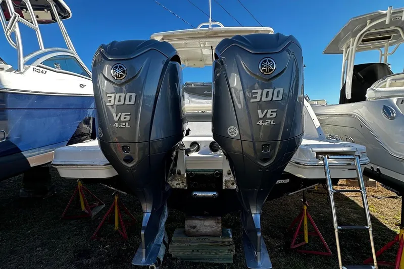 Slide: The Image of 2022 Robalo R317 Dual Console with twin 300 V6 outboard engines. - 14