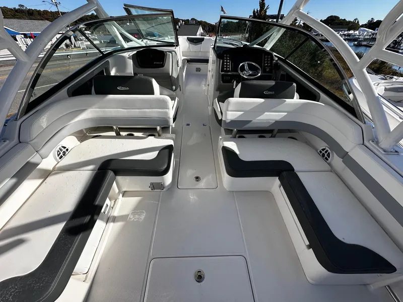 Slide: The Image of 2022 Robalo R317 Dual Console boat interior with spacious seating and modern design. - 6