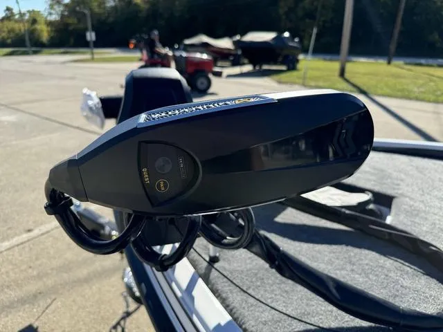 Slide: The Image of Close-up of a 2025 Phoenix 721 ZXL boat component in a parking lot. - 11