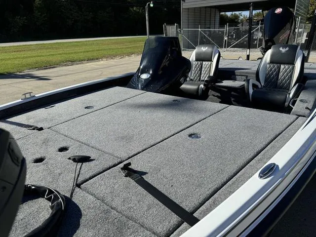 Slide: The Image of 2025 Phoenix 721 ZXL boat with spacious deck and dual seats. - 13