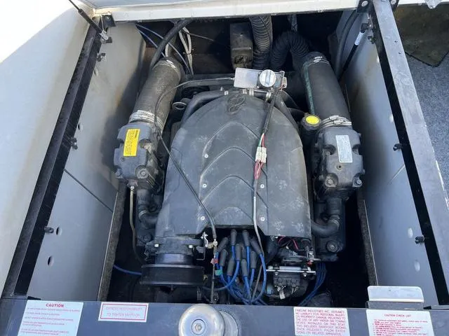 Slide: The Image of 2008 Supreme V232 engine compartment, showcasing detailed mechanical components. - 12