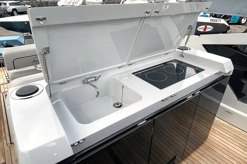 Slide: The Image of Fairline F//Line 33 yacht kitchen with sink and stove, 2022 model. - 37