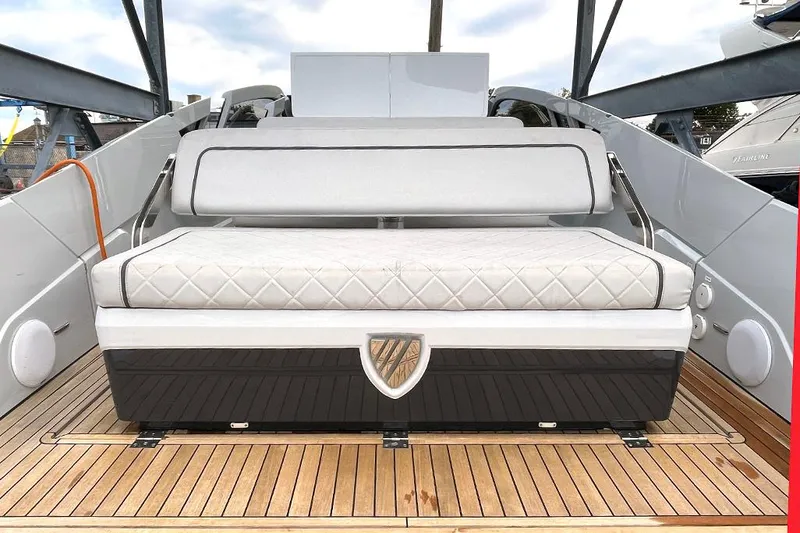 Slide: The Image of 2022 Fairline F//Line 33 yacht interior with luxurious seating on teak deck. - 47