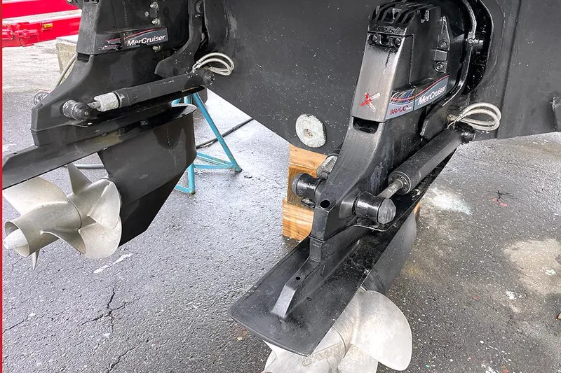 Slide: The Image of Close-up of 2022 Fairline F//Line 33 boat propellers and outboard motor. - 48