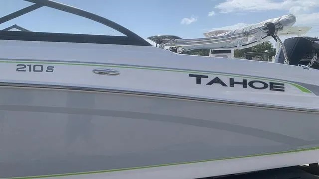 Slide: The Image of 2024 Tahoe 210 S boat with sleek design and modern features. - 10