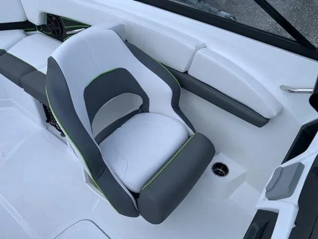 Slide: The Image of 2024 Tahoe 210 S boat interior with sleek, modern seating design. - 39