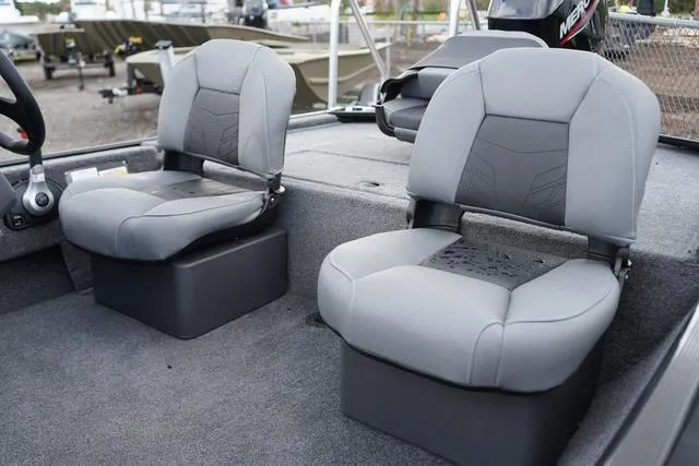 Slide: The Image of 2025 Tracker CLASSIC XL boat interior with two gray seats. - 7