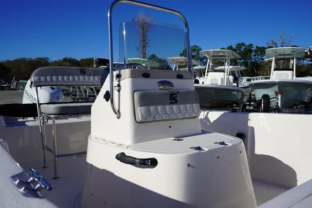 Slide: The Image of 2025 Carolina Skiff 178 JLS boat interior with console and seating. - 13