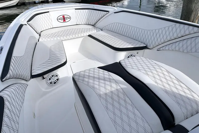 Slide: The Image of 2013 Cigarette 39 Top Gun Open boat interior with stylish seating and diamond-pattern upholstery. - 5