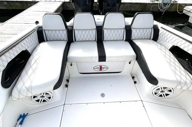 Slide: The Image of 2013 Cigarette 39 Top Gun Open boat interior with white seating and black accents. - 6