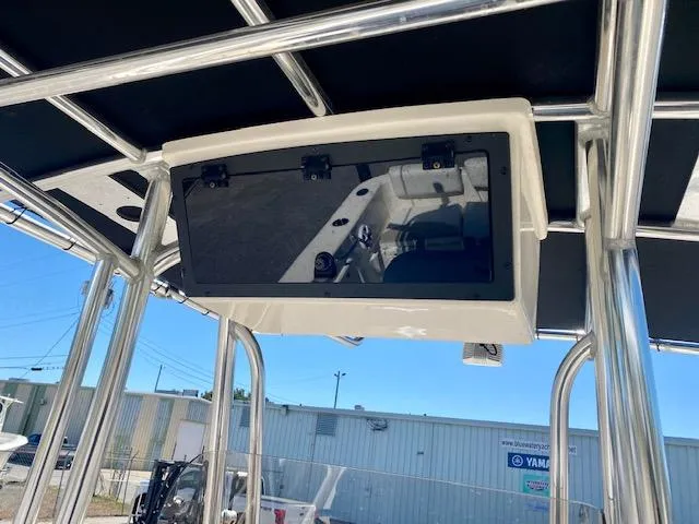 Slide: The Image of 2022 Bulls Bay 230 Center Console boat with T-top and electronics box. - 17