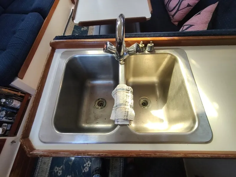 Slide: The Image of Stainless steel double sink in 1990 Catalina C-34 yacht kitchen. - 38