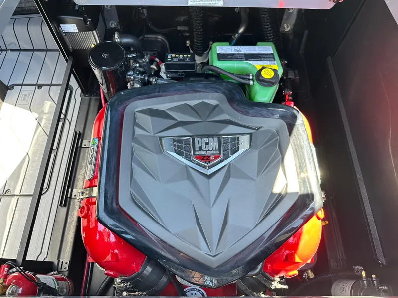 Slide: The Image of Engine compartment of 2025 Nautique Super Air Nautique G23 boat. - 18