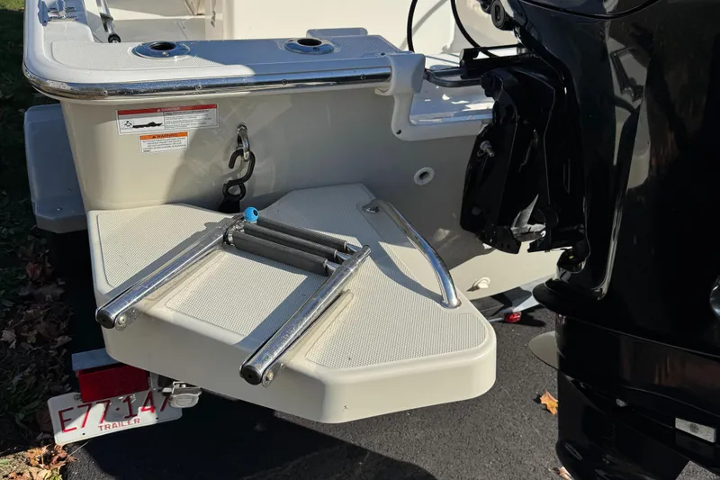 Slide: The Image of 2018 Boston Whaler 170 Montauk boat with swim platform and ladder. - 8