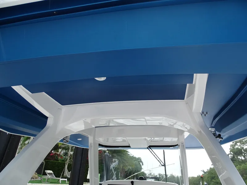 Slide: The Image of 2022 Intrepid 407 Panacea boat interior with blue and white design. - 23
