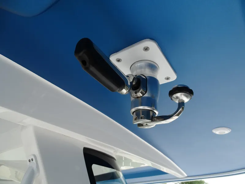 Slide: The Image of Close-up of a 2022 Intrepid 407 Panacea boat's mounted fishing rod holder. - 24