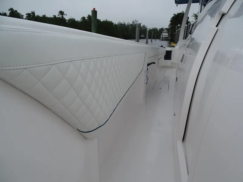Slide: The Image of 2022 Intrepid 407 Panacea boat with white quilted upholstery detail. - 34