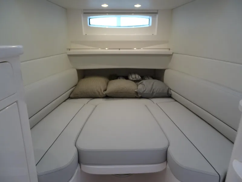 Slide: The Image of Luxurious cabin interior of 2022 Intrepid 407 Panacea with plush seating and cushions. - 42