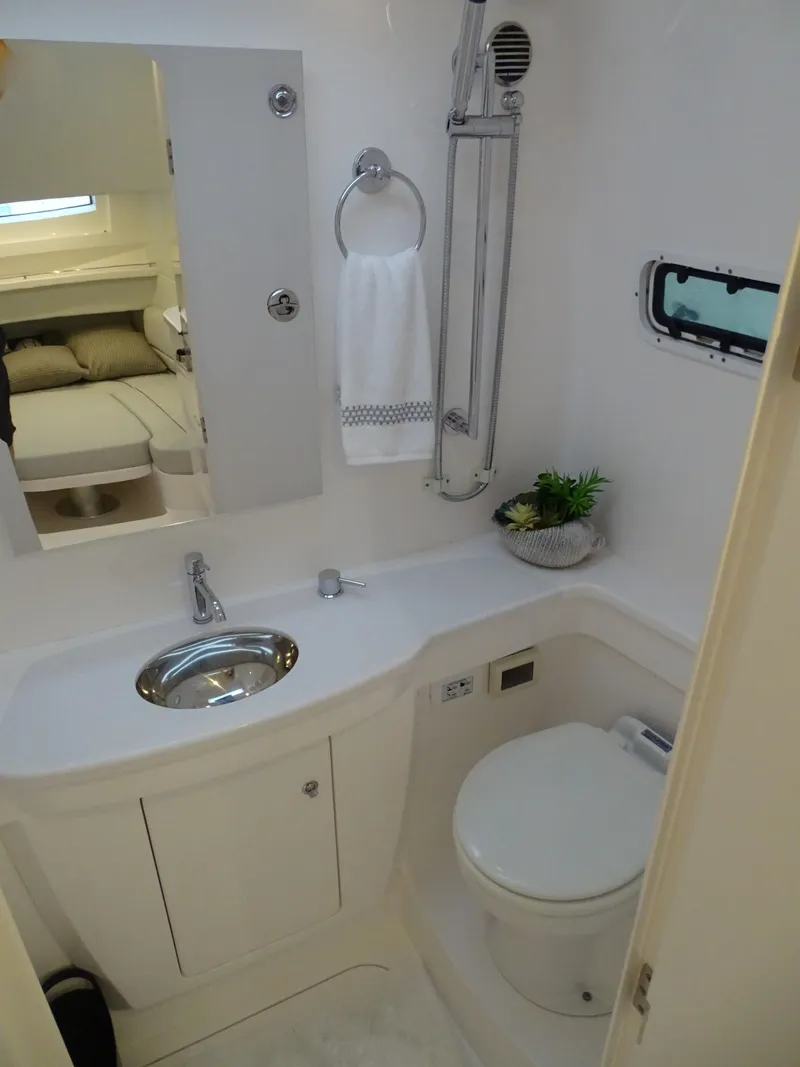 Slide: The Image of 2022 Intrepid 407 Panacea bathroom with sink, toilet, and window. - 44