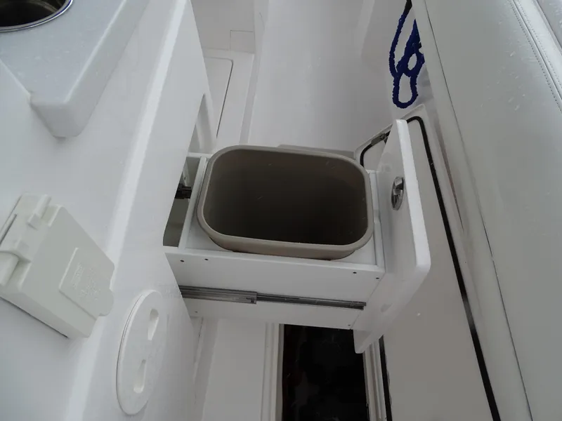 Slide: The Image of Pull-out trash bin on 2022 Intrepid 407 Panacea boat. - 48