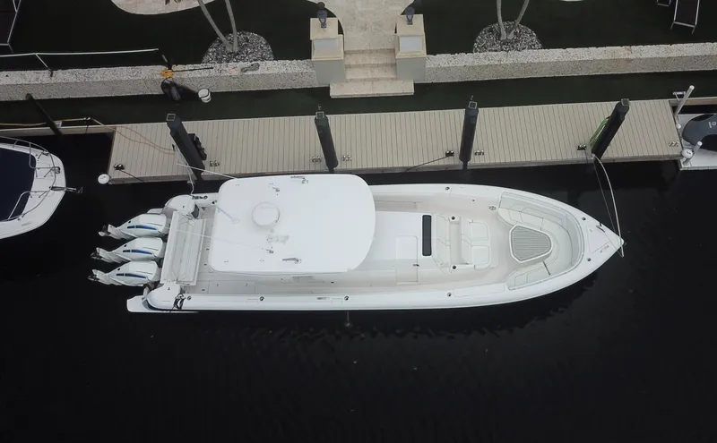 Slide: The Image of Aerial view of 2022 Intrepid 407 Panacea docked at a marina. - 5