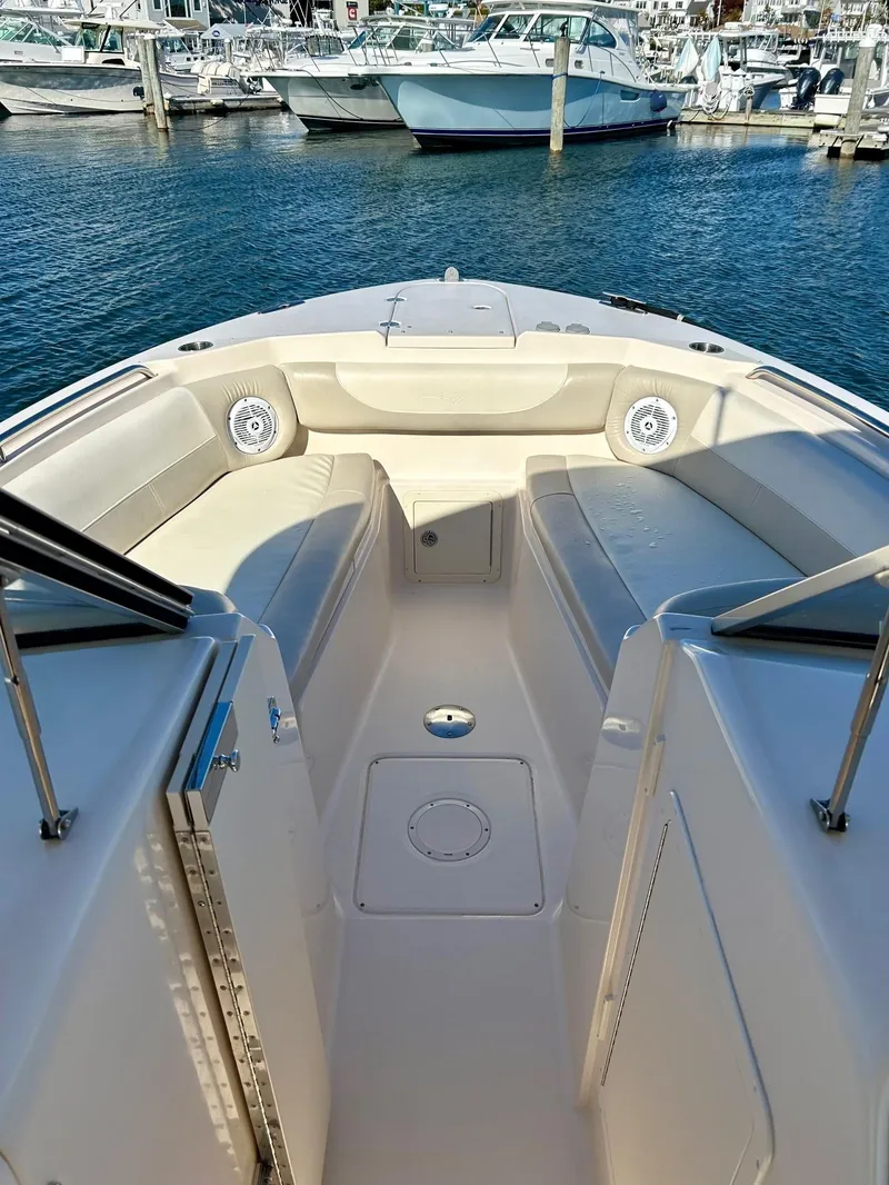 Slide: The Image of 2012 Grady-White Freedom 285 boat interior at marina. - 21
