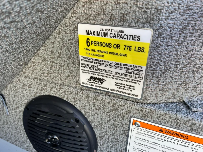 Slide: The Image of 2025 Lund 1775 Adventure Sport capacity label, 6 persons or 775 lbs, safety compliance. - 18