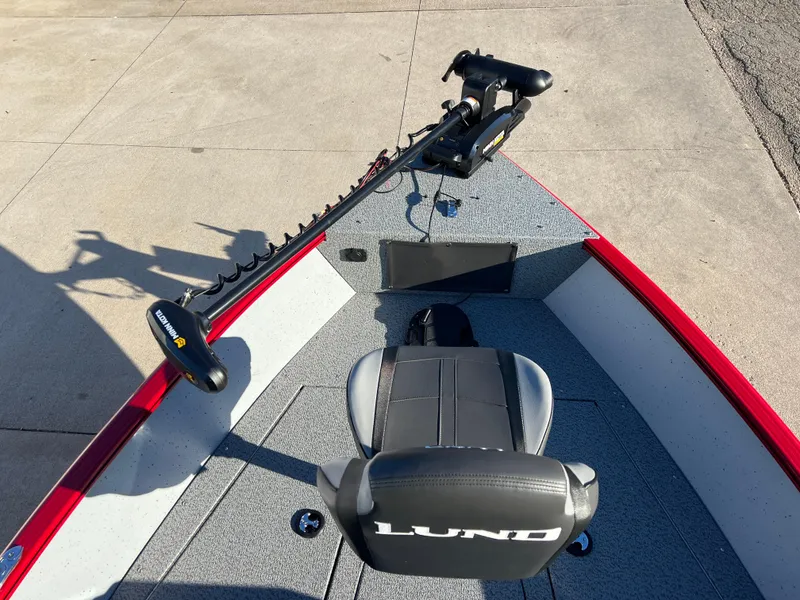 Slide: The Image of 2025 Lund 1775 Adventure Sport boat interior with trolling motor and seating. - 8