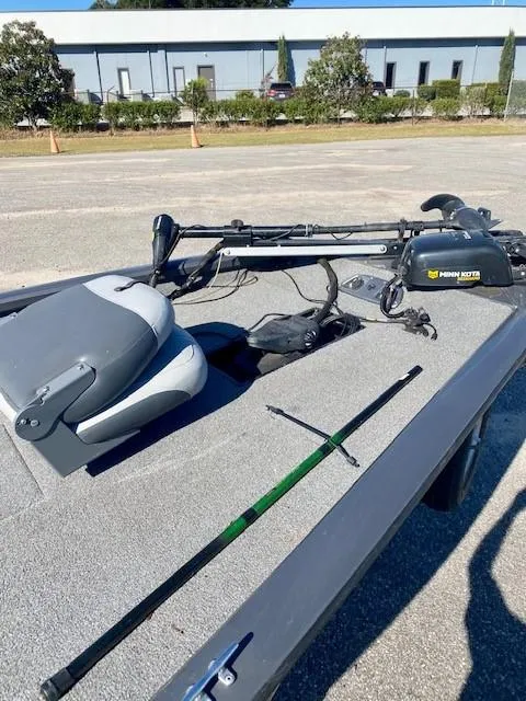 Slide: The Image of 2014 Bass Tracker PRO TEAM 190 boat deck with fishing gear and equipment. - 7