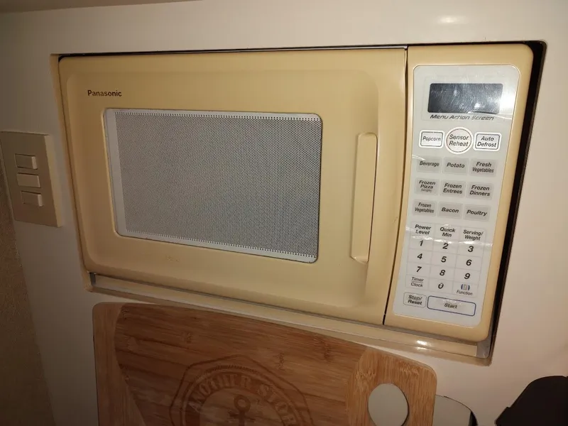 Slide: The Image of Panasonic microwave in a 1999 Maxum 4100 SCR boat kitchen. - 31