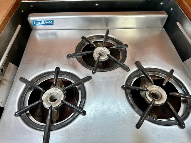 Slide: The Image of Three-burner stove in a 1970 Hinckley 38 yacht kitchen. - 25