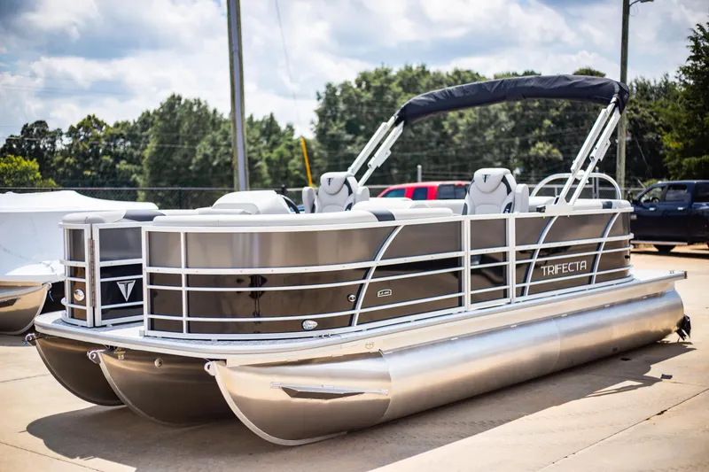 The Image of 2025 Trifecta 22RF LE2.75 pontoon boat in a sunny outdoor setting. - 0