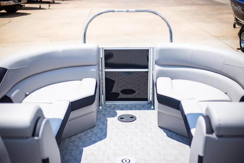 Slide: The Image of 2025 Trifecta 22RF LE2.75 pontoon boat interior with plush seating and modern design. - 2