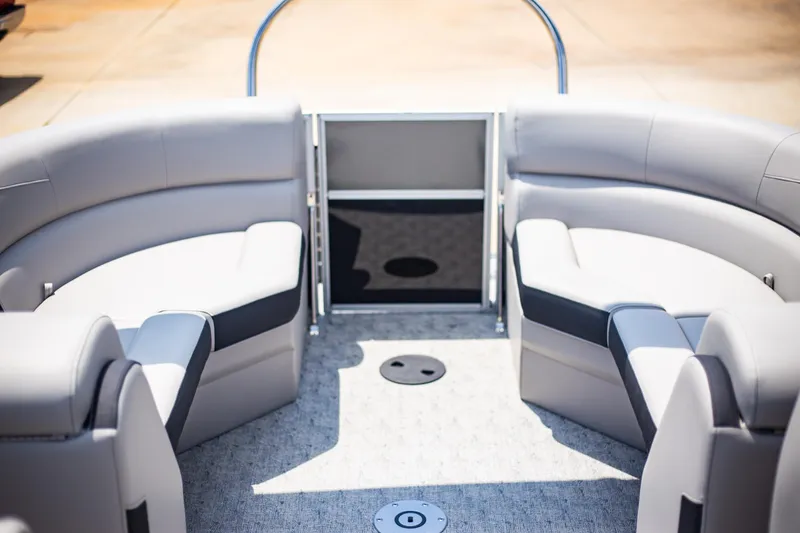 Slide: The Image of 2025 Trifecta 22RF LE2.75 pontoon boat interior with plush seating and modern design. - 9
