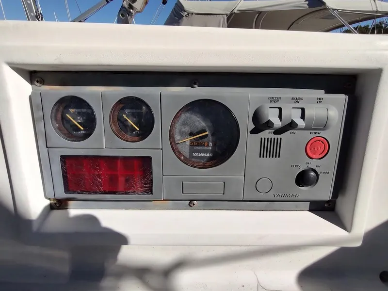 Slide: The Image of Control panel of a 1997 Hylas 46 yacht with gauges and switches. - 21